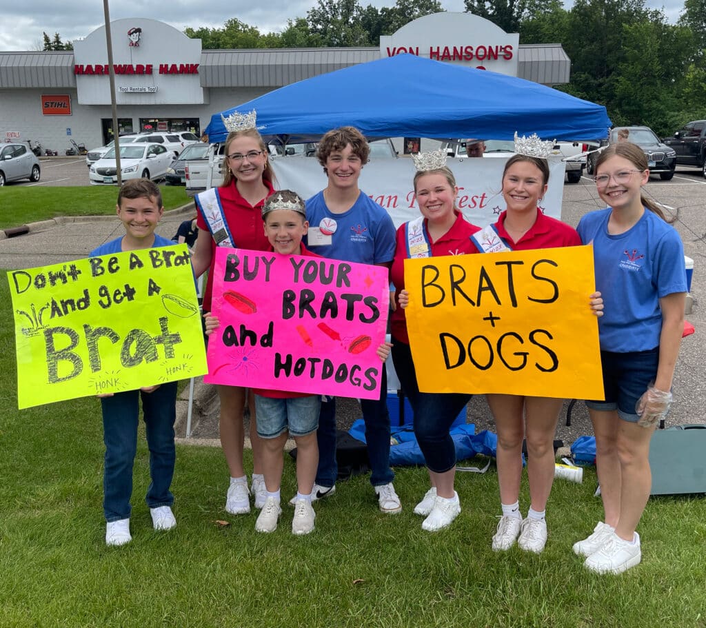 Ambassadors and candidates at the brat stand