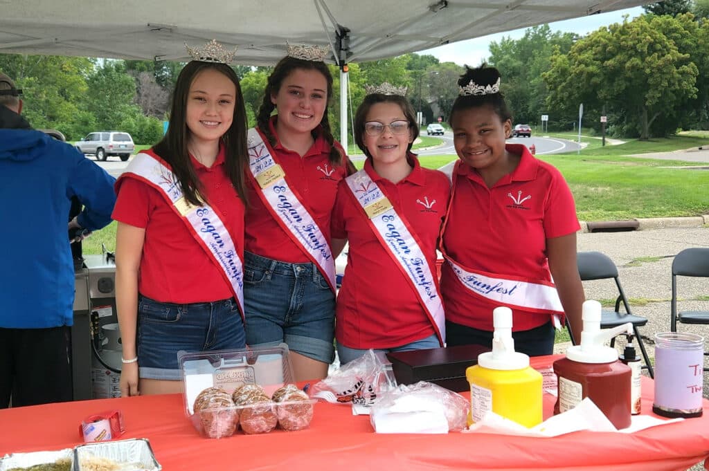 Ambassadors and candidates at the brat stand